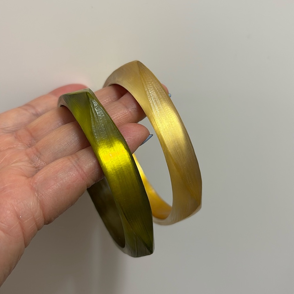 Alexis Bittar iridescent gold and green rounded bangles